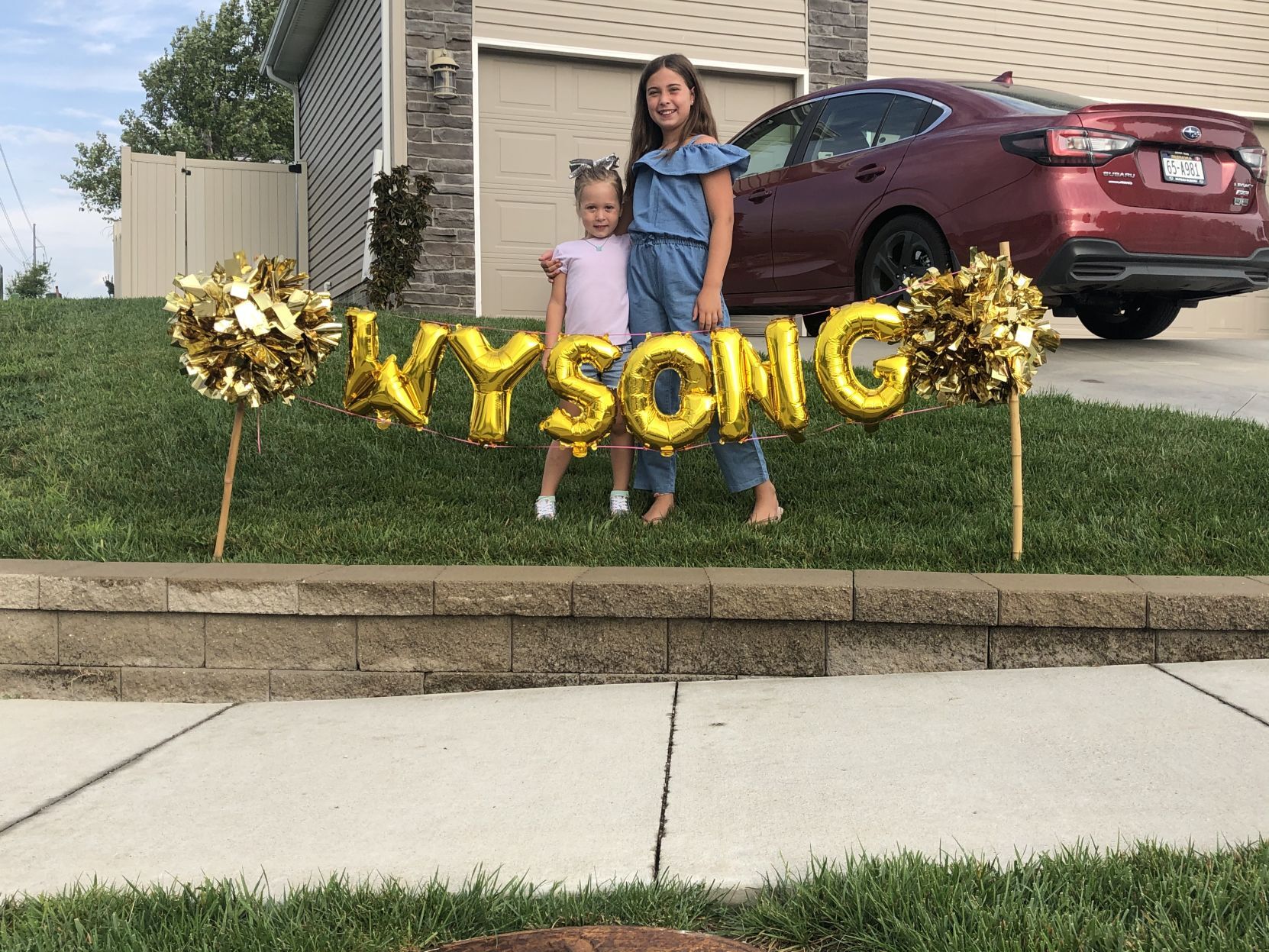 Sisters Cora (5th) and Maya (Kindergarten)